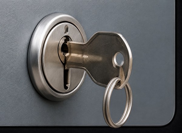 Lock cylinder and key during rekeying and lock change service